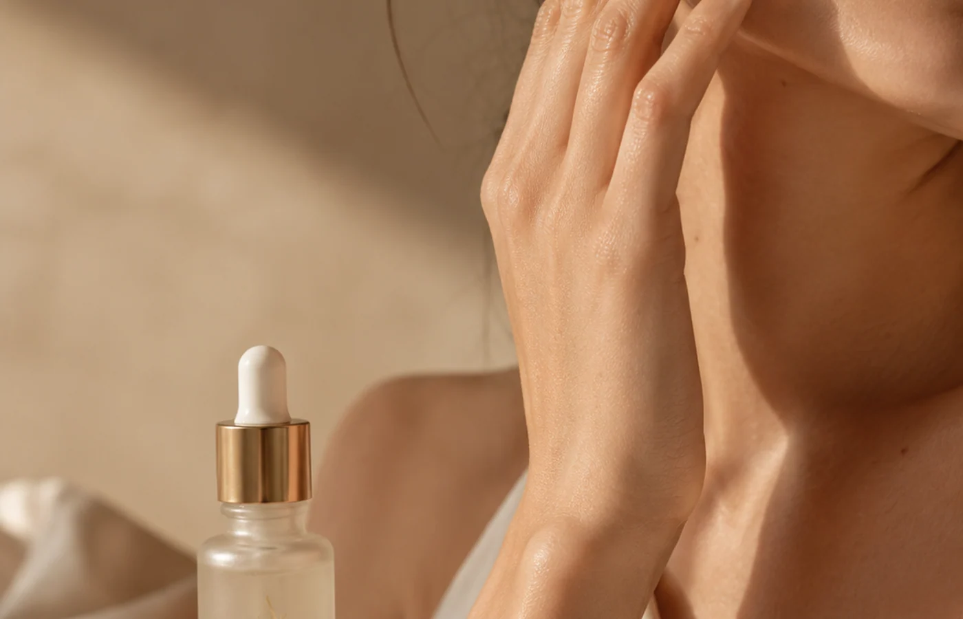 Macro editorial study of serum on natural cheek texture